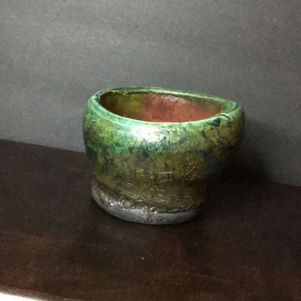 Cup or bowl by T. P.